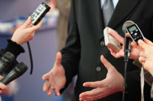 Journalists making media interview